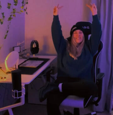 it's me, throwing up peace signs like a dork at my desk